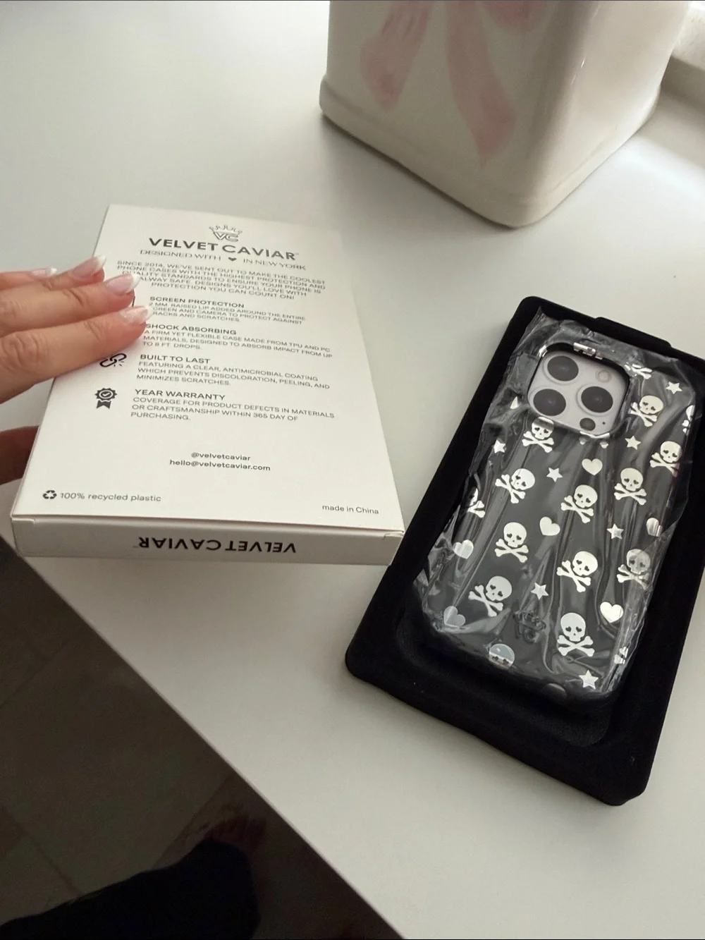 Velvet Caviar iPhone 15 pro Case with White Skulls & Hearts